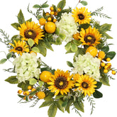 Pudate wreath on front door adds welcoming curb appeal