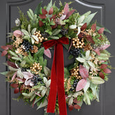 PureCosy wreath on front door showing welcoming purple foliage and glow