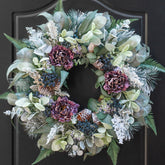 PureCosy wreath on front door adds welcoming holiday curb appeal