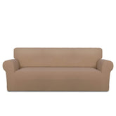PureFit front view on large sofa showing clean camel finish and instant refresh benefit