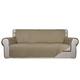 PureFit front view on oversized sofa showing full coverage and clean look