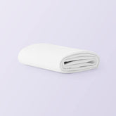 Purple queen front view showing fitted protector and neat corners protecting mattress