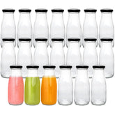 QAPPDA front view of 20-bottle set showing vintage clear glass and black lids for uniform storage