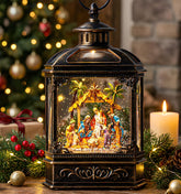 Qualdout front view nativity globe showing warm glow and festive charm