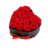 Qutawua heart-shaped box front view showcasing 16 red roses and elegant presentation