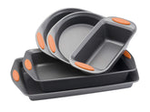 Rachael Ray five-piece bakeware set front view showing pans and orange grips for easy handling