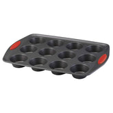 Rachael Ray Yum-o! front view of 12-cup muffin pan showing gray finish and red grips for reliable handling