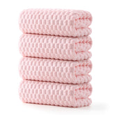 REDKISS front view of folded pink towel set shows coordinated color and softness