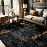 RELEANY front view of black and gold abstract rug showing pattern and scale