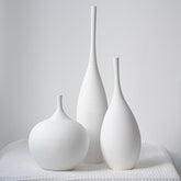 Relexome front view of three vases showing balanced trio for tabletop styling