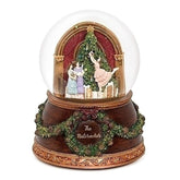 Roman Glitterdome front view showing tree, figures, and warm wood base for festive charm