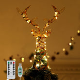 Roylvan front view of reindeer tree topper showcasing warm glow and elegant shape