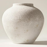 RyddeligHome Arina front view showing round white rustic vase enhancing table centerpiece