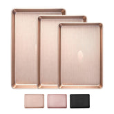 SakerPlus front view of three baking sheets showing champagne finish and sizes
