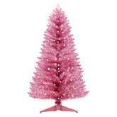 Santanelo pink tree front view showing full shape and snowy tips for instant holiday style