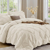 Sasttie comforter front view showing elegant pintuck and beige finish for refined bedding