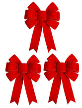 Satenwie front view of three large red velvet bows shows festive presentation and size