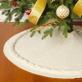 Sattiyrch cream tree skirt front view showing full cable knit and neat edge, adds cozy base