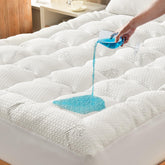 Secgo front view showing topper packaged and ready to protect mattress