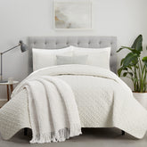 Serta quilt front view showing ivory bedspread and neat finish for instant style