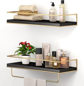 Shario front view of black gold shelves showing sleek storage and style