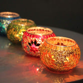 SHMILMH front view of four-color mosaic votive set showing vibrant packaging and colors
