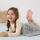 Sivio front view showing compact weighted lap blanket and packaging benefit comfort