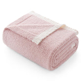 Snuggle Sac folded pink throw blanket showing neat front and cozy appeal