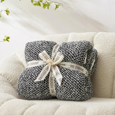 Snuggle Sac front view of heather black throw highlighting size and texture