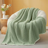 Snuggle Sac sage green throw front view showing neat edges and color, enhances living room comfort