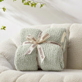 Snuggle Sac folded front view showing plush throw and elegant color