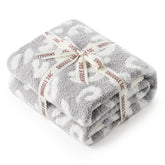 Snuggle Sac front folded showing grey leopard print and stylish impact