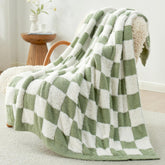Snuggle Sac front view on couch showing sage green checkered style and cozy appeal