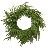Somikis front door wreath styled on entrance adds welcoming greenery
