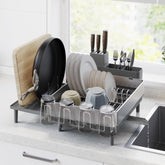 SONGMICS front view showing full rack holding plates and bowls for organized drying