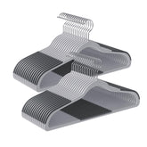 SONGMICS front packaging of 50 hangers showing neat stack and space-saving benefit