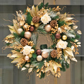 Soomeir front-facing wreath on door showing elegant champagne finish and welcome appeal