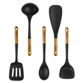 STAUB 5-piece set front view shows sleek black silicone and acacia handles for stylish durability