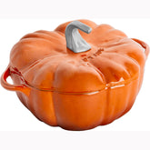 STAUB pumpkin cocotte front view showing burnt orange finish and elegant table presence