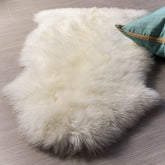 Super Area Rugs front view showing ivory rug and clean packaging, adds warm texture