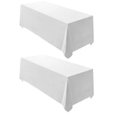 Surmente front view of two white tablecloths showing neat folds and full coverage benefit