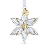 Swarovski 2023 ornament front view showing star shape and ribbon, adds festive sparkle