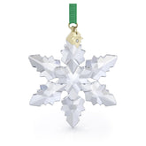 Swarovski ornament front view showing snowflake crystal and gold-tone finish, elegant display