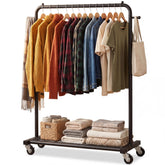 Sywhitta front view of black clothing rack showing hangers and shelf benefit organization