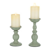 Sziqiqi front view of sage iron candle holders showing elegant silhouette and stability