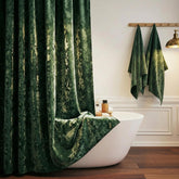 TAMGHO front view showing dark green velvet curtain enhancing bathroom elegance