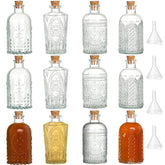 TBWIND clear glass bottles front pack showing assorted vintage designs and stable bases