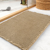 tchdio front view of 24x36 waffle bath mat showing size and color, enhances bathroom comfort