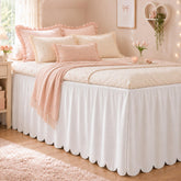 Tenceur front view showing full white scalloped bed skirt benefit neat coverage