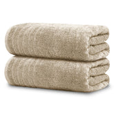 Tens Towels front view showing two beige bath sheets and packaging, highlighting value